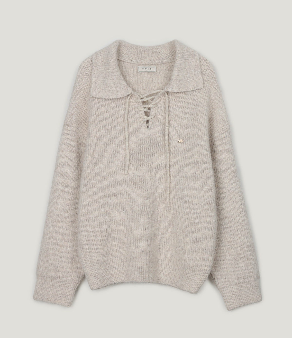 [TWEE] 통기성 레이스업 루즈핏 니트